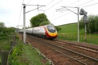 The 1150 Glasgow Central - London Euston Virgin Pendolino service at speed about to pass the site of the former Cleghorn station on 15 May 2008.<br><br>[John Furnevel 15/05/2008]