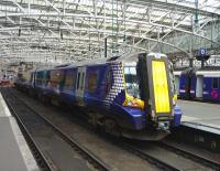 380 009 awaits its departure time from Glasgow Central on 26 April 2012.<br><br>[John Steven 26/04/2012]
