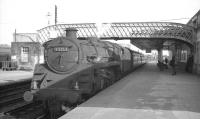 One of St Rollox shed's Standard class 5 4-6-0s no 73153 with a down train at Stirling in the summer of 1966. <br><br>[K A Gray //1966]