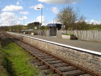 Cilmeri Station on the Heart of Wales line seen from a rarely used occupation crossing to the road on the left. The village is some half mile to the right <br><br>[David Pesterfield 12/04/2012]