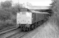 25033 passes through the site of Blackford Hill station with a westbound freight in November 1977.<br><br>[Bill Roberton /11/1977]