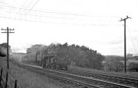 BR Standard Class 4 2-6-0 no 76071 approaching Fairlie from the south with a train on the Largs branch in July 1962. Note work in progress on Hunterston 'A' nuclear power station in the right background. <br><br>[R Sillitto/A Renfrew Collection (Courtesy Bruce McCartney) /07/1962]