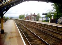 Less passengers than in the 2010 view from the same spot [see image 30654], but Arnside station still looks great in May 2012.<br><br>[Ken Strachan 13/05/2012]