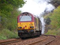 A4 4464 Bittern speeds away from Dalgety Bay on 19 May with the 'Cathedrals Explorer' from Durham to Inverness, banked by 67025... not what it looks like!<br><br>[Bill Roberton 19/05/2012]