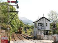 A 158 forming the 10.35 Edinburgh - Inverness comes off the Tilt Viaduct on an exceptionally hot 28 May and slows for the Blair Atholl stop. Platform view south over Ford Road level crossing.<br><br>[John Furnevel 28/05/2012]