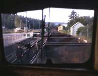 The train guard, PW Inspector Jockie Ross and the Lairg signalman walk the track - as seen from the rear cab of a PW train in summer 1974. The photographer was supplementing his duties as Senior Railman at Invergordon to earn Sunday overtime with the engineers - the only BR job which paid double-time in those days!<br><br>[David Spaven //1974]