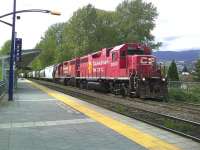 A freight train consisting of 120 empty grain hoppers passing through Coquitlam, British Columbia, on 8 May 2012.<br><br>[Malcolm Chattwood 08/05/2012]