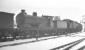 Ex-Caledonian 4-4-0 no 54502 'stored' at a snowy Carstairs in February 1963, approximately 5 months after official withdrawal from Dumfries shed. Eventual disposal was through McWilliams of Shettleston the following September.<br><br>[K A Gray 02/02/1963]