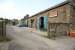 The former goods shed, station building and station house at Leyburn looking west from the site of the goods yard in June 2011. Closed by BR in 1954, Leyburn is now part of the Wensleydale Railway. [See image 1451]<br><br>[John Furnevel 27/06/2011]