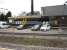 Former Fastline 56302 stabled in front of Cardiff Panel Box building on the south side of Cardiff Central Station on 20 March 2012. Its rake of empty steel wagons stood alongside the main line near Canton depot. <br><br>[David Pesterfield 20/03/2012]