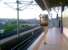 A 'wide boy' unit [see image 37875] is caught in the driver's passenger boarding mirror at Santolan terminus on line 2. Line 2 to Recto goes ahead to the right; the curved line on the viaduct on the left leads to the line 2 depot. Footnote September 2012: regular depot tours are now available to the general public.<br><br>[Ken Strachan 11/01/2012]