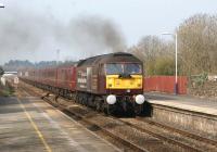 A Compass Tours charter to Carlisle approaches Bamber Bridge station on 23 March 2012 with 47786 leading and 47826 on the rear.<br><br>[John McIntyre 23/03/2012]