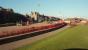 Around 1996 the remains of Lossiemouth station were tidied up into a garden and carpark. This 1997 view looks towards the buffer stops with the remains of the very long single platform on the left. The nearly as long goods loading bank remains out of shot off to the right.<br><br>[Ewan Crawford 02/02/1997]