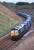 DRS 66430 coasts downhill to the south of Gleneagles on 12 April with the 4D47 Inverness - Mossend intermodal, composed entirely of Tesco containers.<br>
 <br>
<br>
 <br><br>[Bill Roberton 12/04/2012]