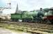 Scene in the sidings to the south of Lockerbie on 13 June 1959 during the SLS 'Golden Jubilee Special' railtour from Glasgow Central. Locomotive no 49 <I>Gordon Highlander</I> has just completed the run-round manoeuvre and is awaiting the signal to take the train back into the platform before commencing the next leg of the journey to Dumfries via Lochmaben. [See image 37446]<br><br>[A Snapper (Courtesy Bruce McCartney) /06/1959]