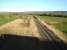 Looking west from the A484 Kidwelly bypass along the Gwendraeth Valley line before it disappears beneath undergrowth in the far distance. [See image 38432]<br><br>[David Pesterfield 12/04/2012]