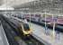 Platform 7 at Manchester Piccadilly sees Cross Country Voyager 221117 awaiting departure for Bristol Temple Meads. In Platform 5 a Pendolino is on a Euston service, which these days run at 20 minute intervals from here. <br><br>[Mark Bartlett 23/03/2012]