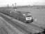 An unidentified 'Western' locomotive approaching Worle Junction from the Bristol direction in 1962. The train is signalled for the main line rather than the Weston-super-Mare loop.<br><br>[John Thorn //1962]