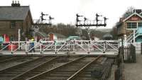 The gates of Front Street level crossing at Grosmont looking north towards the station on 3 April 2008. Standing at the platforms on this occasion are A4 Pacific no 60009 <I>Union of South Africa</I> awaiting its departure time with a train for Pickering, with EE Type 3 no D6700 stabled just beyond the signal box.<br><br>[John Furnevel 03/04/2008]