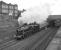 Preserved Black 5 No. 5305 sets off from Leeds on 30 April 1977 and takes the Harrogate line at Wortley Junction on the loco's first public outing after restoration to main-line running order by the Humberside Locomotive Preservation Group. The 4-6-0 worked the railtour (organised by the HLPG) through to Scarborough and is thought to have brought it back to Leeds, although it had only been advertised to do so as far as York (with thanks to Vic Smith).<br><br>[Bill Jamieson 30/04/1977]