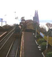 A northbound goods drifts down the grade from the Forth Bridge through North Queensferry station in November 1963 behind a B1 4-6-0.<br><br>[Frank Spaven Collection (Courtesy David Spaven) /11/1963]