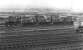 The morning of Sunday 5th September 1976 finds a row of apparently dumped class 03 shunters at the east end of Healey Mills Yard. In fact No. 03 097 in the middle was the only one of this trio not to see further service - 03 047 on the left was only in store and would not be withdrawn until the middle of 1979, while 03 111 on the right was reinstated a couple of months later at Gateshead TMD and soldiered on into 1980.<br><br>[Bill Jamieson 05/09/1976]