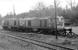 20137 and classmate take a rest from banking duties at Beattock, seen from a passing train in December 1974.<br><br>[Bill Roberton /12/1974]