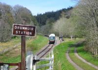 The 14.00 Dufftown - Keith service calls at Drummuir on a sunny 20 May, with a number of walkers disembarking.<br><br>[F Furnevel 20/05/2012]
