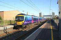 A First TransPennine Express service to Manchester Airport, comprising two Class 185 units, calls at Lockerbie station on the evening of 27 May 2012.<br><br>[John McIntyre 27/05/2012]
