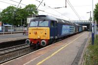 A pair of DRS Class 57s with 57002 leading, heading south through Leyland station on 23 May 2012 with the 6K73 Sellafield to Crewe freight.<br><br>[John McIntyre 23/05/2012]
