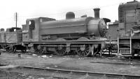 J52 0-6-0ST no 68824, thought to have been photographed awaiting its fate at Doncaster Works in May 1959. The locomotive had been withdrawn from Ardsley shed around 2 months earlier.<br><br>[K A Gray 24/05/1959]