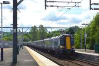 A 7-coach 380 from Glasgow gingerly squeezes into Platform 2 at the new Gourock station on 1st June 2012. <br><br>[Colin Miller 01/06/2012]