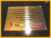A plaque commemorating the 150th anniversary of the Inverness - Dingwall lines presented by David Simpson, Network Rail Managing Director in Scotland, to Richard Ardern of the Friends of the Far North Line before their AGM in Dingwall on 11 June 2012.<br><br>[John Yellowlees 11/06/2012]
