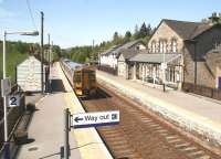 The 10.35 Edinburgh - Inverness service restarts following the stop at Blair Atholl on 28 May 2012.<br><br>[John Furnevel 28/05/2012]