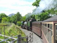 The Welsh Highland Railway's Beyer-Garratt no 143 photographed on 14 June en route to Porthmadog.<br><br>[Peter Todd 14/06/2012]