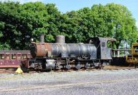 Requires some attention. A derelict 2-8-2 in the sidings at Dinas on the Welsh Highland Railway in June 2012.<br><br>[Peter Todd 14/06/2012]