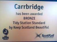 The new plaque on display at Carrbridge station in June 2012.... [welcome recognition for our planting, watering and litter picking over the past year. GC]<br><br>[Gus Carnegie /06/2012]