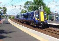 A train from Gourock to Glasgow Central calls at Port Glasgow 1 June 2012 in some welcome sunshine.<br><br>[Colin Miller 01/06/2012]