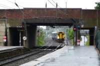 In the monsoon of 28 June the 10.06 for Kilmarnock approaches Ayr station ex-Girvan.  <br><br>[Colin Miller 28/06/2012]