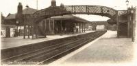 General view of Johnstone Station, probably taken around 1930. Note Johnstone No.1 Signal Box just beyond the bridge, controlling Johnstone Junction amongst other things. Johnstone No.2 Signal Box was slightly South of the station and lasted until 1985 when it burned down <br><br>[Graham Morgan Collection //1930]
