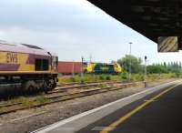 66096 and 70009 with freights at Didcot.<br><br>[Peter Todd 28/06/2012]