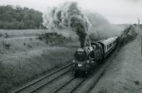 RCTS/SLS RAIL TOUR OF SCOTLAND 21st June 1962<br><br>
80129 near Kilmacolm heading to Greenock Princes Pier.<br><br>[Jim Currie (Courtesy Stephenson Locomotive Society) 21/06/1962]