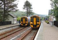 Strathcarron station, a lovely spot, sees trains cross twice a day. This view in July 2012 shows 158715 heading for Kyle with 158719 eastbound for Inverness. <br><br>[Mark Bartlett 11/07/2012]