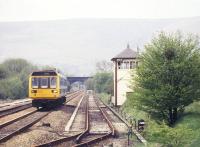 A Manchester Piccadilly - Sheffield train passing Edale signal box in the Peak District in June 2001.<br><br>[Ian Dinmore /06/2001]