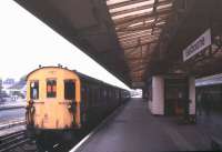 Platform scene at Eastbourne station in November 1988. No. 1107 is a Class 207 DEMU, in this case with a substitute DMBS vehicle from a Class 202 or 203 Hastings unit.<br><br>[Ian Dinmore /11/1988]