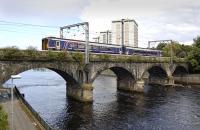 156 449 crossing the River Ayr on the approach to Ayr station with the 11.42 to Stranraer in July 2012. For the same scene in the 1970s [see image 4128].<br><br>[Bill Roberton 19/07/2012]