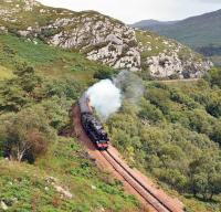 Black 5 no 45407 <I>The Lancashire Fusilier</I> at the head of 'The Royal Highlander' tackles the 1 in 50 out of Lochailort heading for Mallaig.<br><br>[John Gray /07/2012]