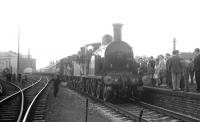 A crowded platform at Silloth station on 13 June 1964. The train attracting all the attention is the RCTS (West Riding Branch) <I>'Solway Ranger'</I> which had originated from Leeds City that morning. CR123 + no 49 <I>Gordon Highlander</I> handled the Carlisle - Silloth section of the tour and are seen here preparing for the return journey.<br><br>[K A Gray 13/06/1964]
