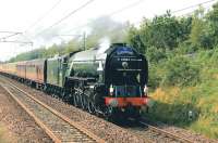 Heading for London King's Cross, A1 Pacific no 60163 <I>Tornado</I> races along the East Coast Main Line near Musselburgh on 25 July 2012 hauling 'The Elizabethan' Diamond Jubilee Special.<br><br>[John Gray 25/07/2012]