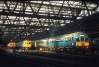 Sunlight pierces the gloom at Leith Central in 1972, by which time the old station had been closed for 20 years and was in use as a diesel servicing facility. Leith Central was allocated a shed code of 64H. [See image 27361]<br><br>[Bill Roberton //1972]